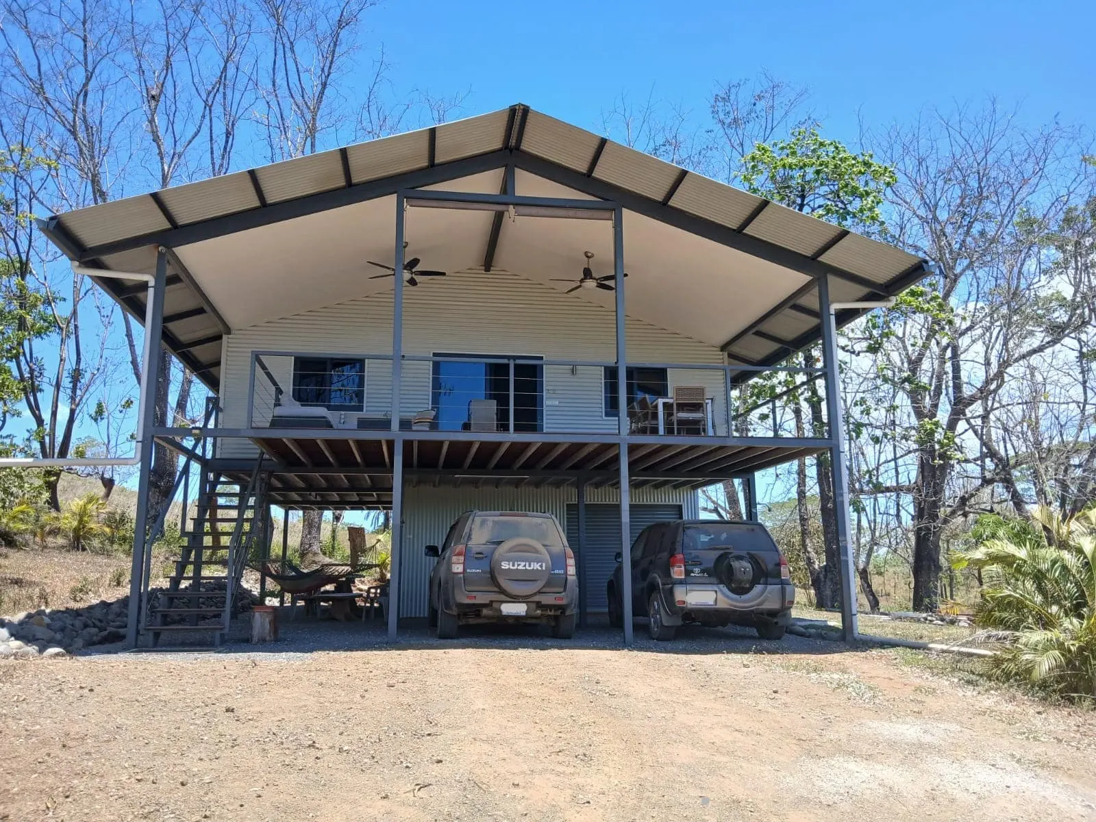 Off-Grid Modern Home on 2.39 Acres with Motocross Track near Cobano photo 2