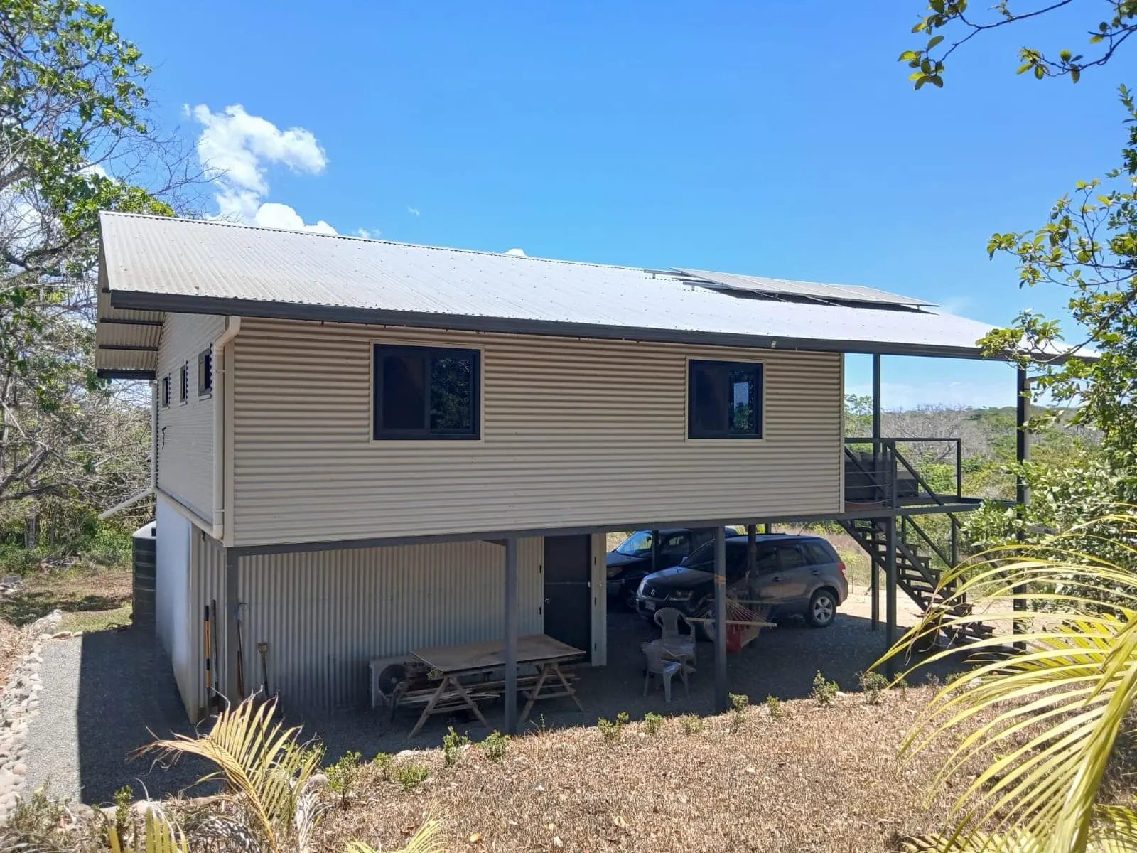 Off-Grid Modern Home on 2.39 Acres with Motocross Track near Cobano photo 3